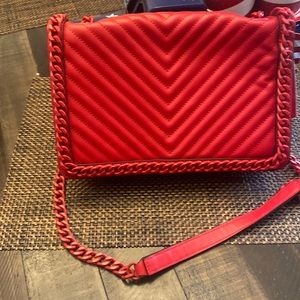 Aldo red bag.